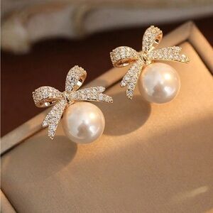 Rhinestone faux pearl bow earrings